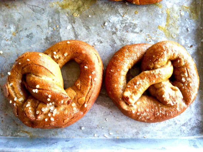 Served Fresh and warm from the oven with a soft flavorful inside and a slightly crisp bite, these Homemade German Pretzels are perfect for when you want something a little more than just chips and dip!