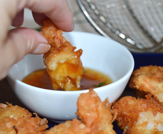 Simple coconut shrimp that taste even better than what you get at a restaurant.  They are juicy on the inside, crunchy on the outside.  A must make for a casual dinner along side a salad or as an appetizer with your favorite tropical cocktail!