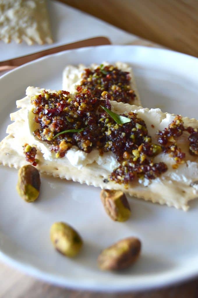 Looking for a festive spread for the holidays? This Cranberry Pistachio spread is not only easy peasy, but bursting with flavor and just the thing for a simple appetizer. Spread it on your favorite cracker and it’s a mouthful of deliciousness.