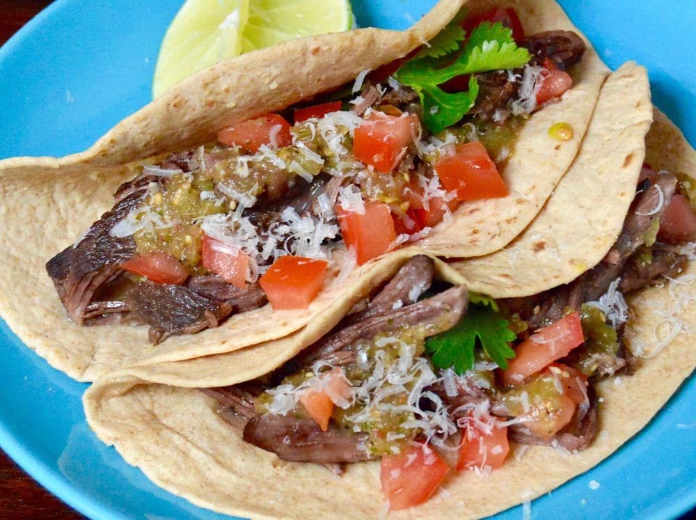 Simple Short Rib tacos with homemade tomatillo salsa out of the leftovers from the day before in less than 30 minutes! Easy recipe that's fast and delicious! A complete win/win! www.westviamidwest.com