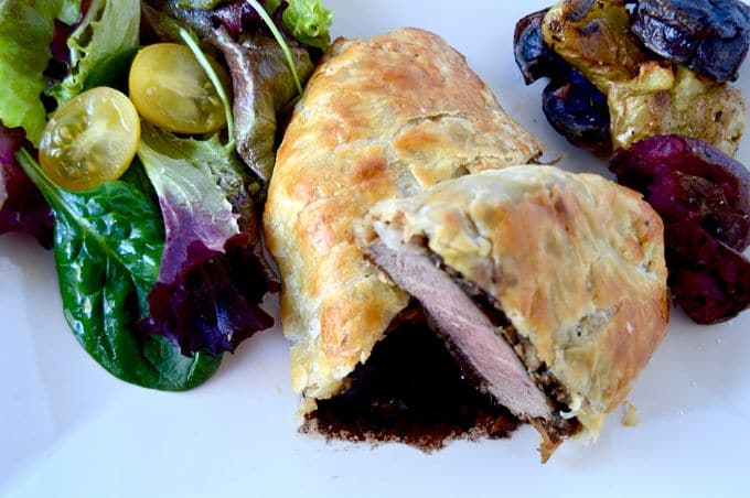 Simple Beef Wellington looks impressive. It’s a flaky puff pastry crust wrapped around a juicy beef filet that also is perfectly slathered with mushrooms and prosciutto. Top it off with an easy-peasy stock full of flavor red wine sauce…. That special someone will definitely love you for this recipe.
