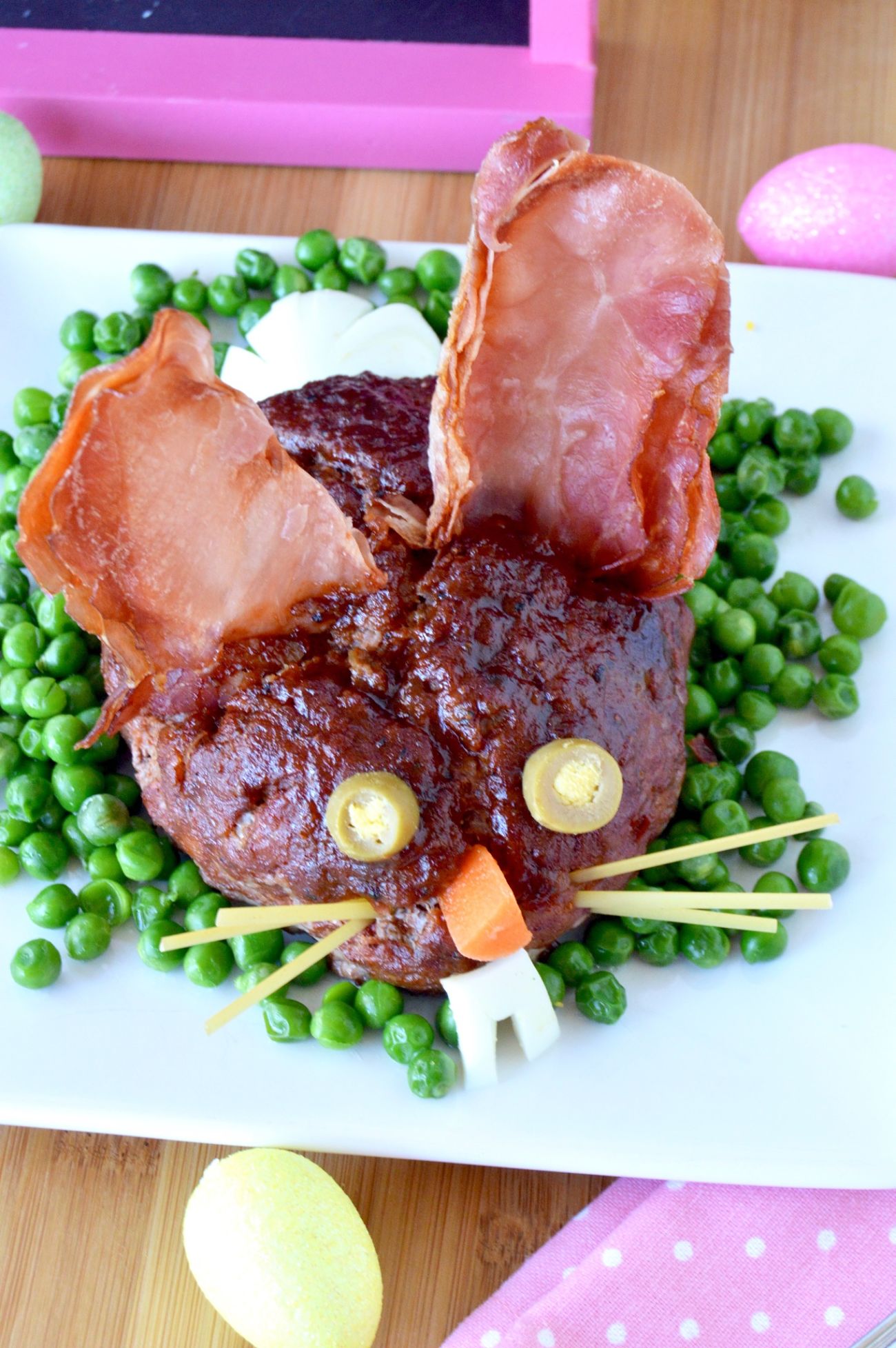 meatloaf in the shape of a bunny on a white plate 