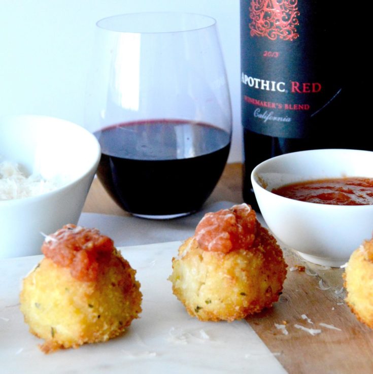 Gruyere Salami Risotto Balls (Arancini): An easy appetizer to make from leftover risotto. These Arancini balls are filled with a melty, stretchy Gruyere cheese and a spicy salami. Those are surrounded by risotto that is rolled in panko and fried for a crunchy bite of deliciousness!Gruyere Salami Risotto Balls (Arancini): An easy appetizer to make from leftover risotto these Arancini balls are filled with a melty, stretchy Gruyere cheese and a spicy and salami. Those are surrounded by risotto that is rolled in panko and fried for a crunchy bite of deliciousness!