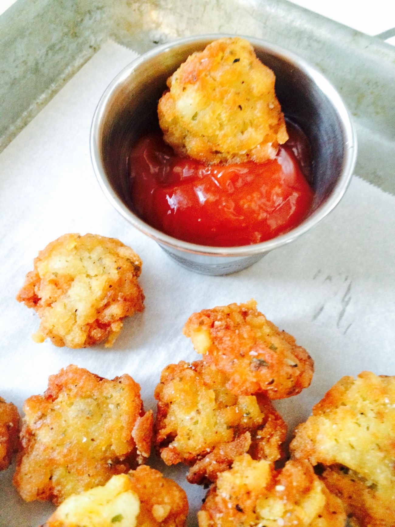 Crunchy Bite Sized Bacon Tots will be the hit of your next get together. Whether served as an appetizer or a side dish you will LOVE these crunchy, bacon filled tots. Better than your average tot because it has Bacon in it too!