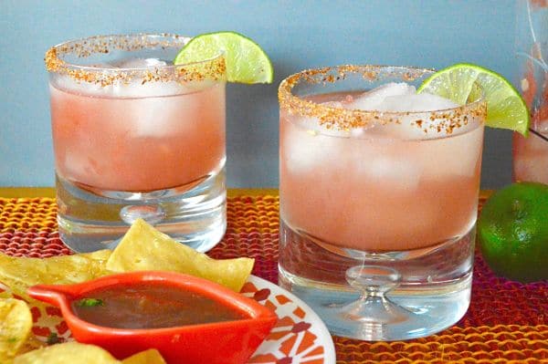 A change up from the classic cocktail this Amped up Watermelon Margarita with a kick is bursting with the fruit flavor muddled with lots of lime juice but the first taste you get is the chili lime salt which gives the drink a nice kick! (non-alcoholic option too!)