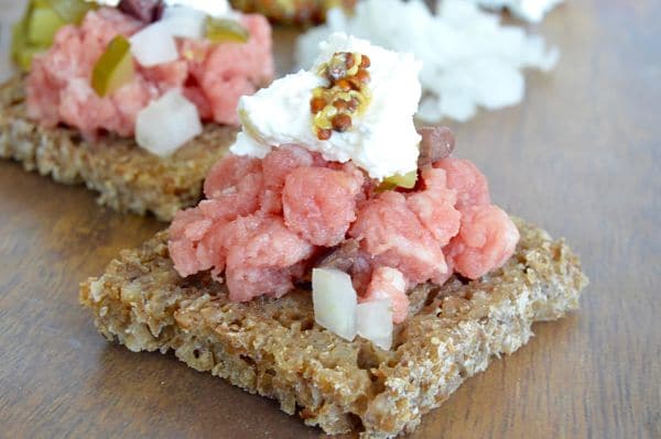 Steak Tartare, one of the easiest recipes you'll ever make. Perfect for a party, each person can mix their own flavor accents to order... thus pleasing the most picky, yet adventuresome guests!