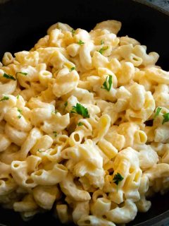 Homemade gouda mac n cheese recipe is creamy, extra velvety and swirls perfectly around al dente pasta with extra cheese sauce in each crevice for pure deliciousness in each forkful.