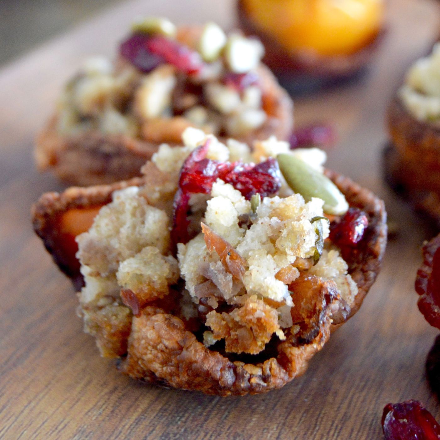 Leftover Stuffing Bacon cups will use up all your leftover stuffing! Make bacon cups, spoon the stuffing in, top with some cranberries and nuts and you have a delicious bite sized snack!