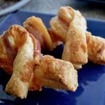 Bacon Cheese Pastry Puffs can be made quickly and with things you already have in your fridge. Cheesy in the center, wrapped with bacon each puff pastry bite is jammed full of flavor.