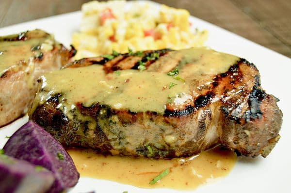 Juicy Grilled Honey Mustard Glazed Pork Chops is the no fail way to make succulent, tender chops. Marinate for 30 minutes, grill and have them on the table in about 15 minutes.