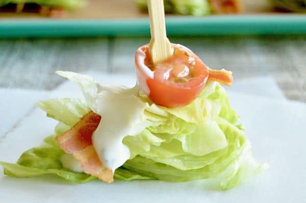 BLT's Salad Bites are a simple starter for any party.  They can be made ahead and just drizzled with homemade Blue Cheese Dressing at the last minute!