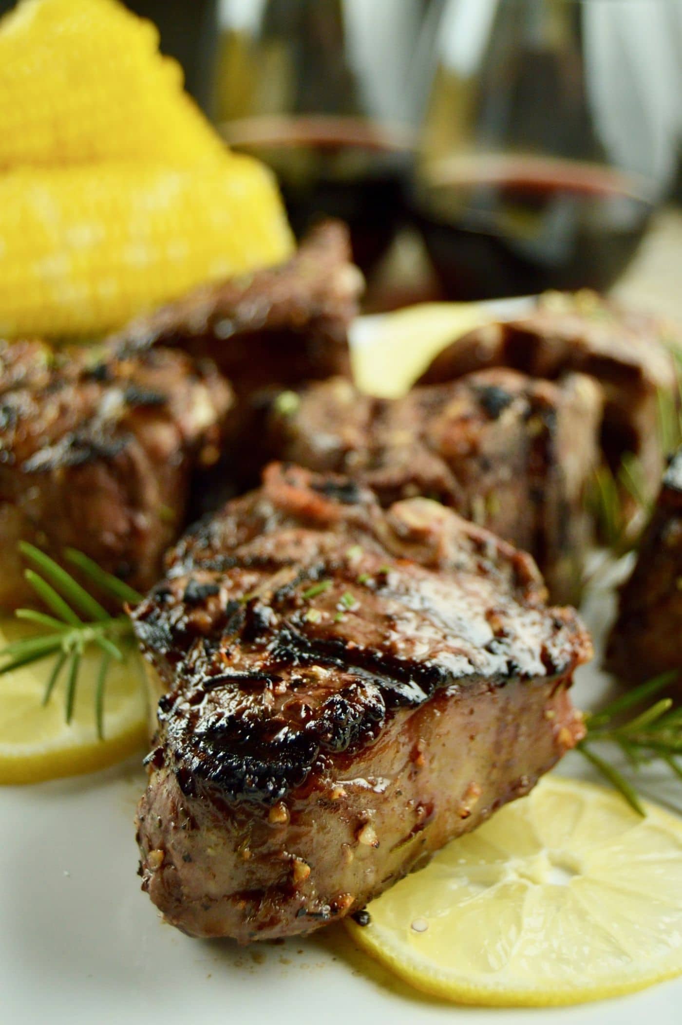 No Fail Grilled Lamb Chops are marinated in rosemary, garlic and citrus for a simple yet elegant meal for entertaining.  Ideal to serve at summer and fall gatherings.