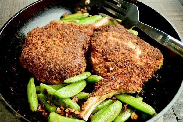 Parmesan Crusted Pork Chops are an ideal meal for easy weeknight entertaining. Panko laced with tangy parmesan, crunchy outside crust over succulent tender pork chops.