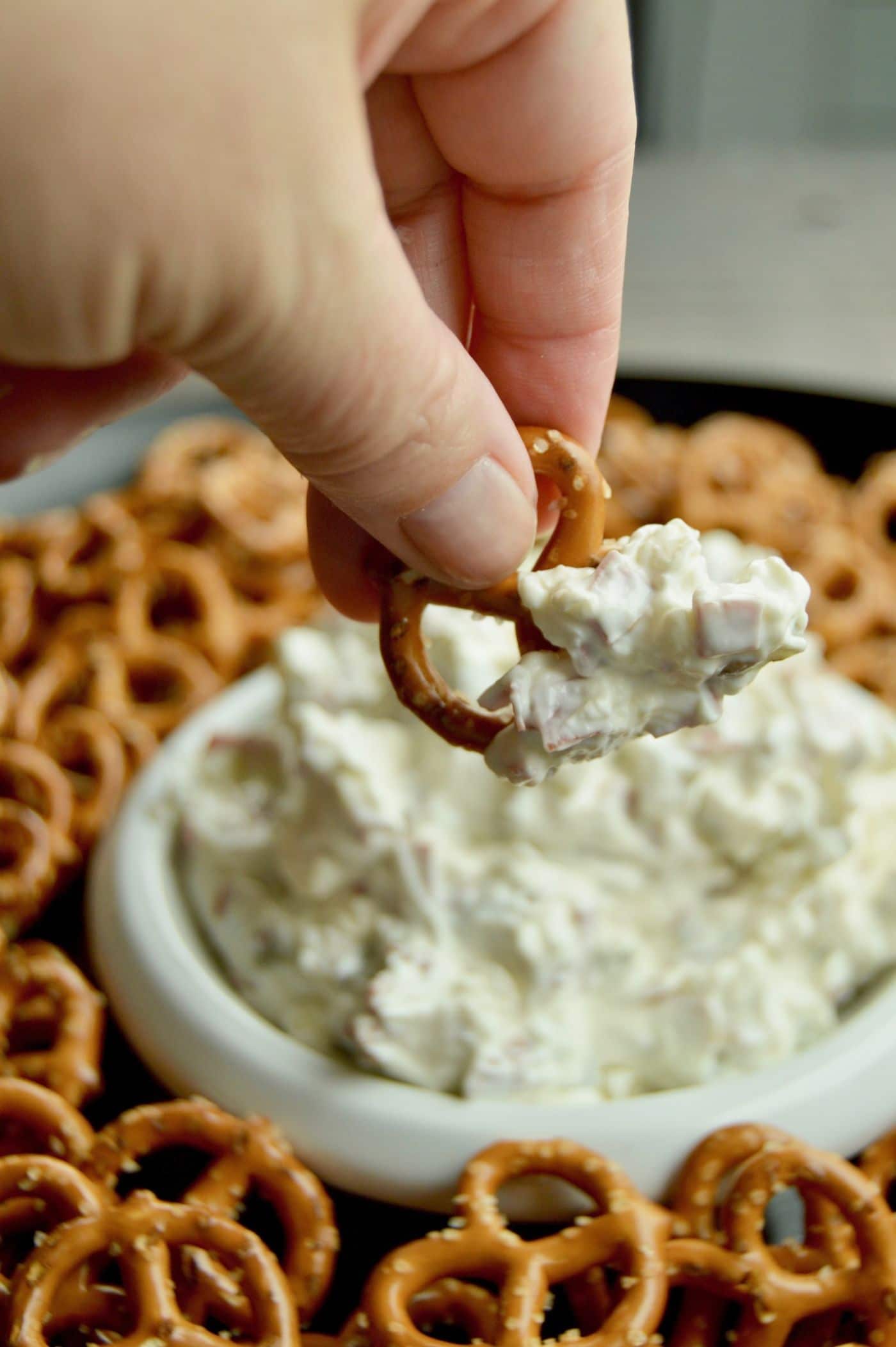 Classic Dried Beef Pickle dip is a recipe classic. A twist on the beef rollups with pickle dip you can make this up in 10 minutes and have it ready for Game day or a snack to serve during game nights!