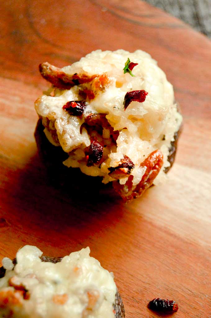 Melty cheese stuffed rice in a mushroom cap appetizer