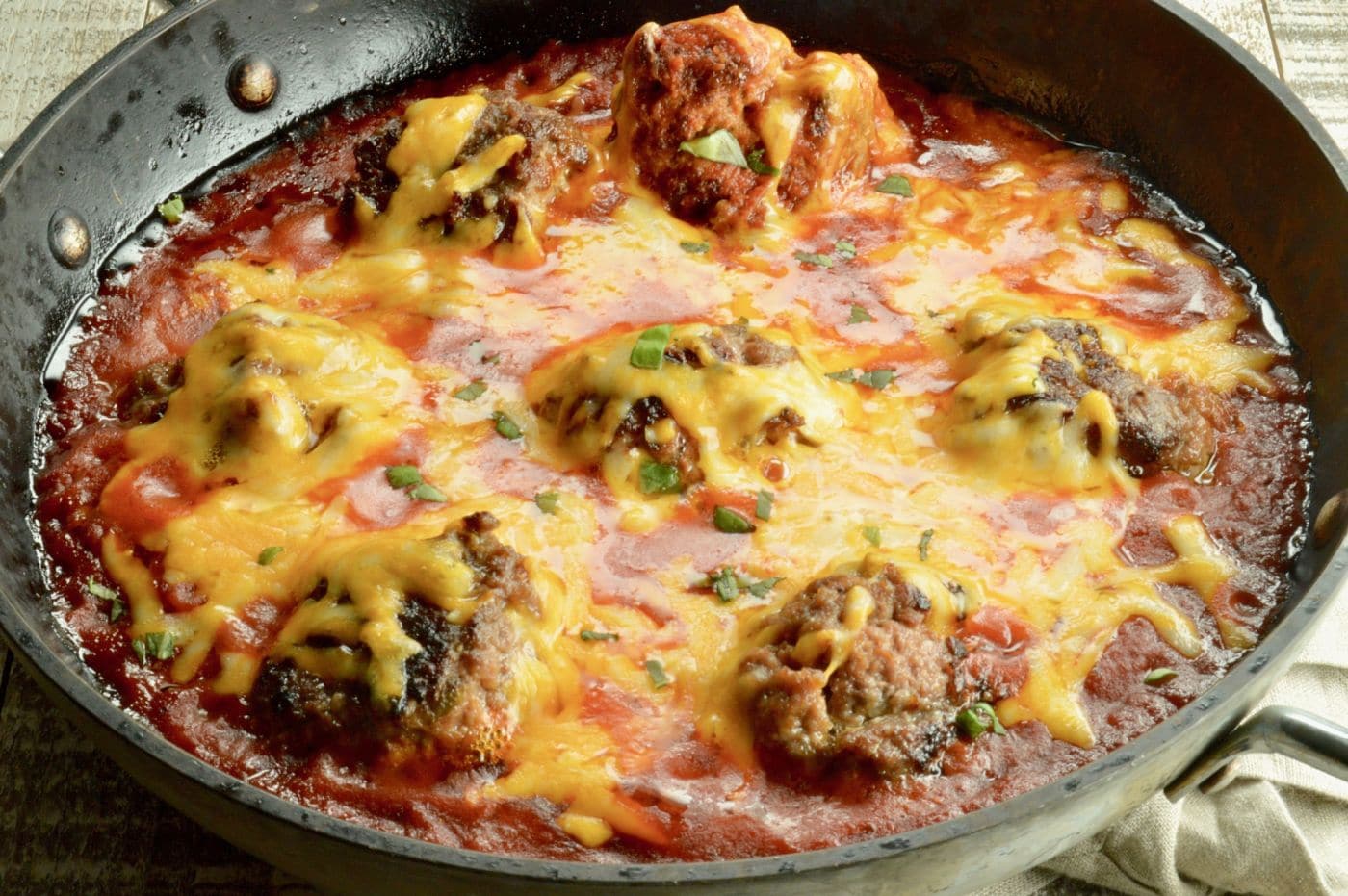 Top of cheesy Meatball Skillet dip in the pan!