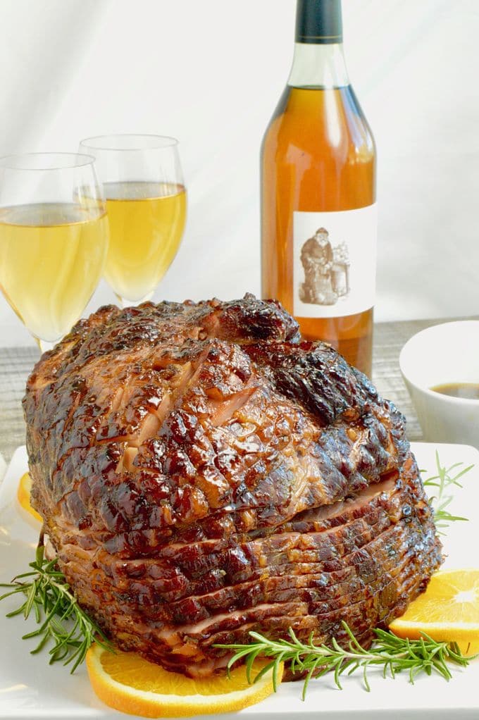 Honey Mustard Ham Glaze is tangy and bold and full of both the sweetness of the honey and the citrus of the orange. This simple ham recipe will become a family favorite request for all holidays!