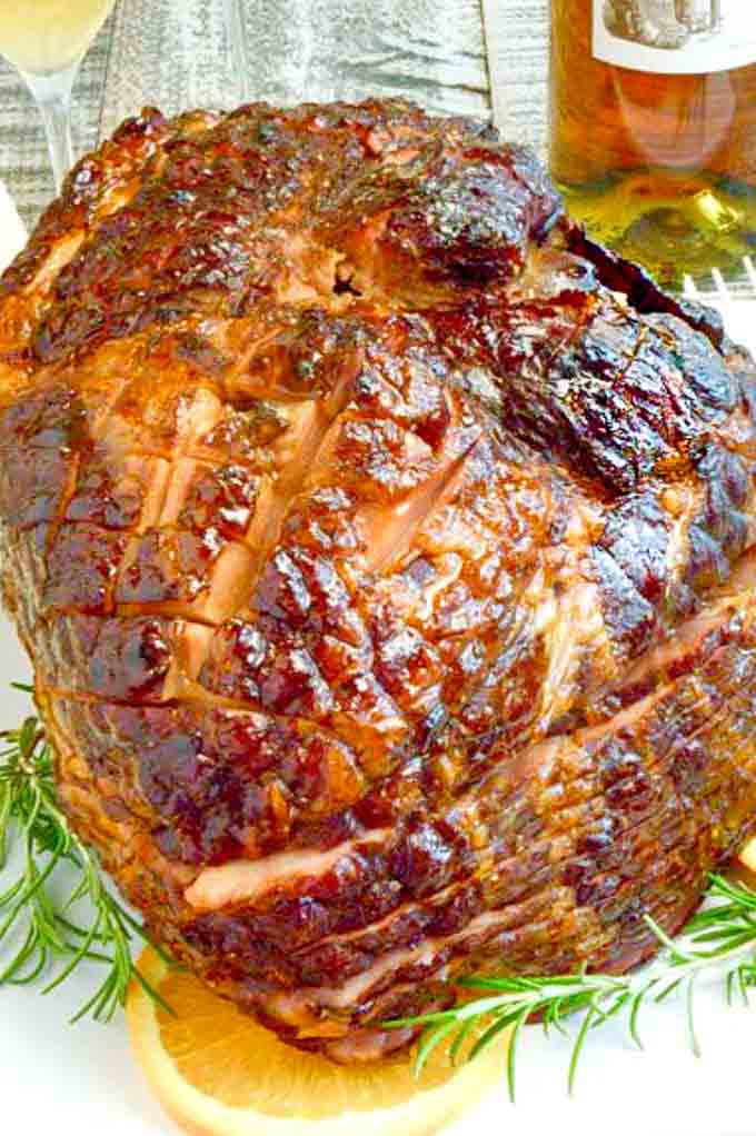 Golden Glazed Ham with bourbon ready to serve on the table