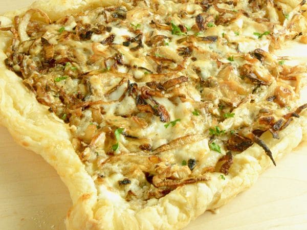 Close up of a French onion Tart made on puff pastry