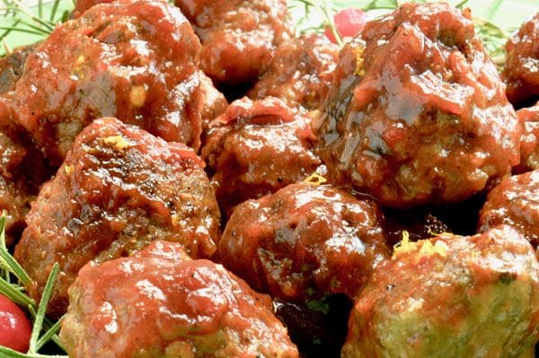 Close up of Cranberry Meatballs on a platter for serving at a party.