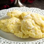 Gooey Lemon Butter cookies are the crinkle cookies you love to get at Christmas in food gifts, gooey, tart lemon centers that have a light powdered sugar! Made quick and easy that come out perfect every time!