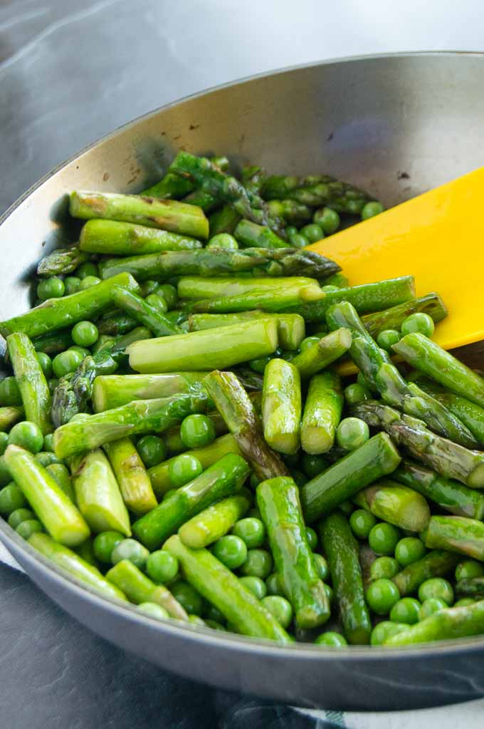 Sauteing fresh peas and asparagus for Asparagus Risotto