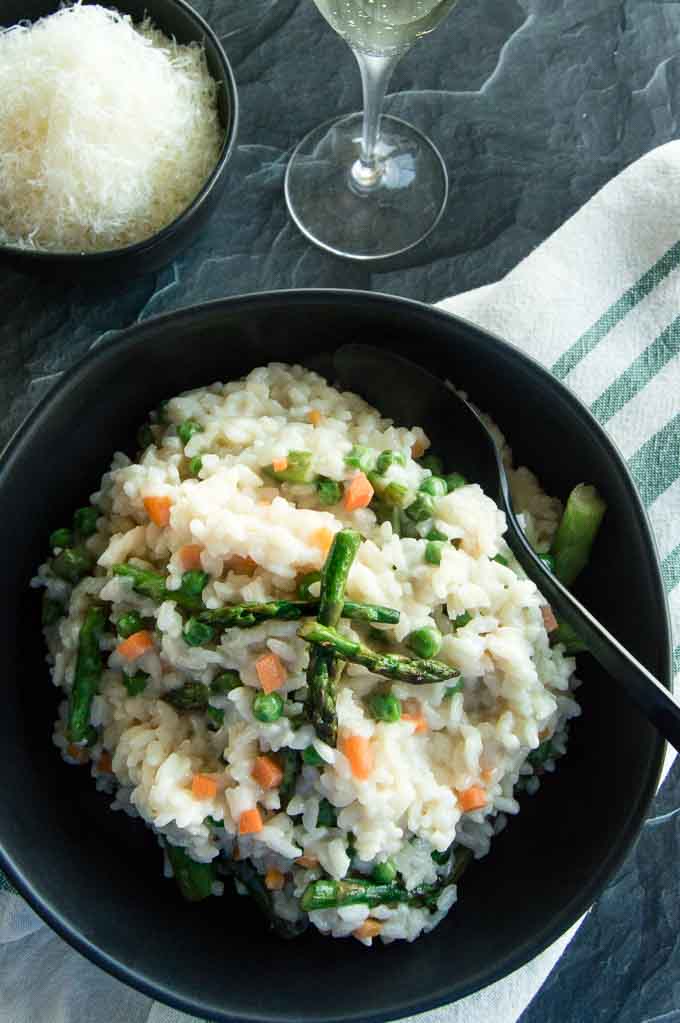 Asparagus and Pea Risotto with a glass of wine