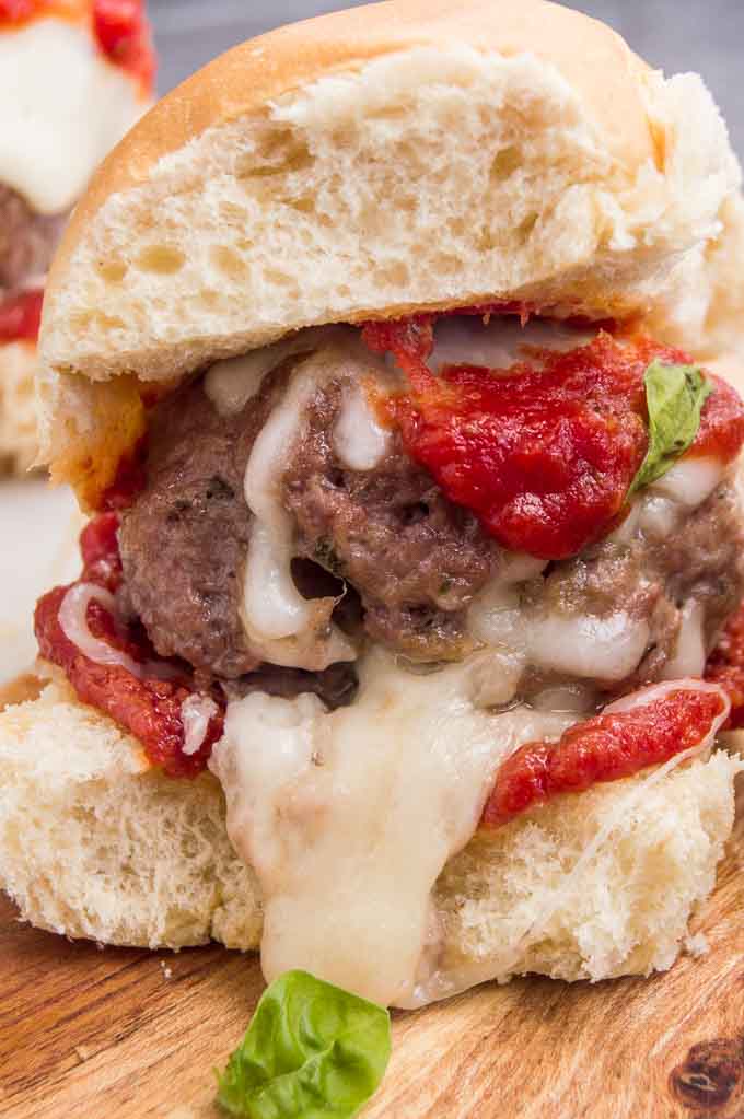 These Italian Meatball sliders are an easy meal for bite sized deliciousness.  Serve them for game day watching or for a light, but filling meal for company!  