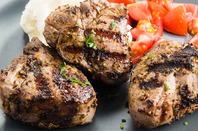 This easy pan sautéed Greek style Lamb Chop recipe comes together in no time.  Marinated in Mediterranean herbs and spices and brushed with mustard each little chop is tender, juicy and flavorful.  