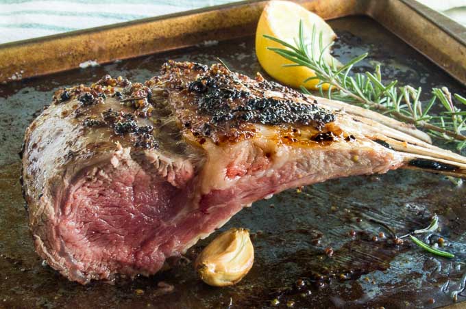 This No Fail Roast Rack of Lamb Recipe couldn't be any easier.  It yields a tender juicy bite with the perfect seared crust in about 30 minutes for ideal entertaining! 