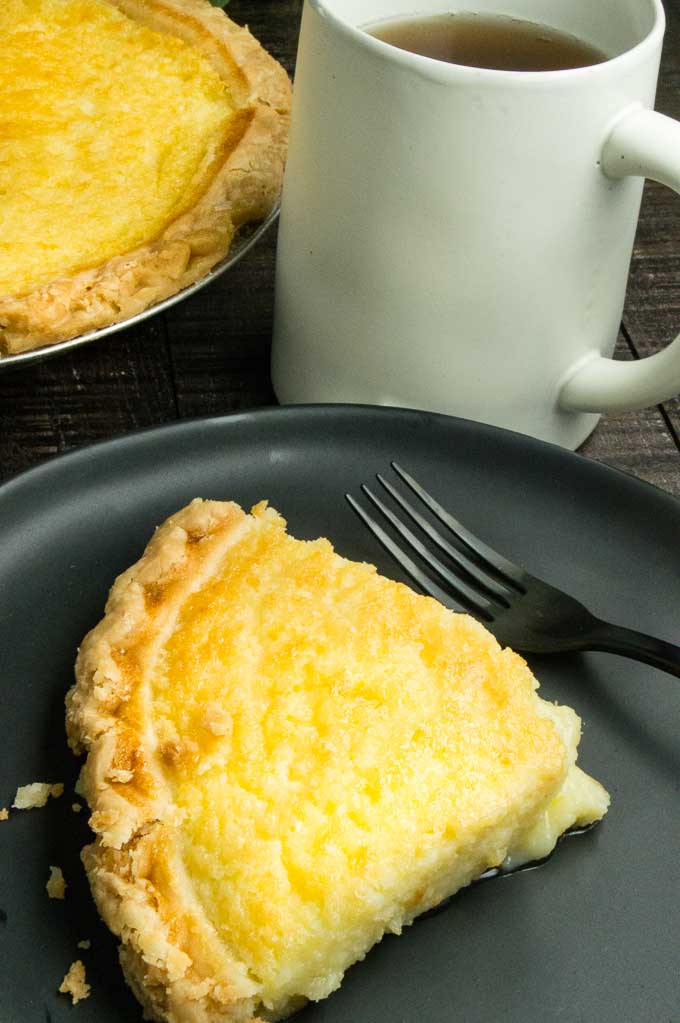 Southern Buttermilk Pie slice on a plate.