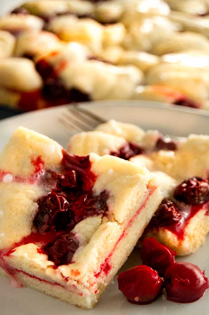 Cherry Kuchen Bars on a plate for eating