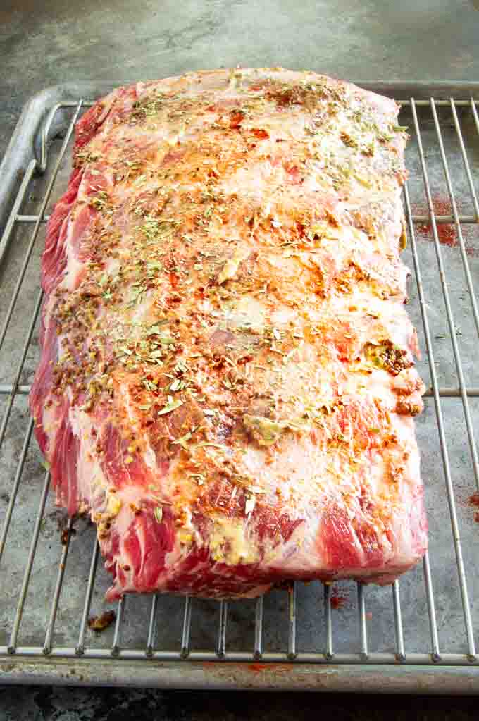 Large Meaty slab of BBQ Beef ribs, seasoned and ready to go into the oven