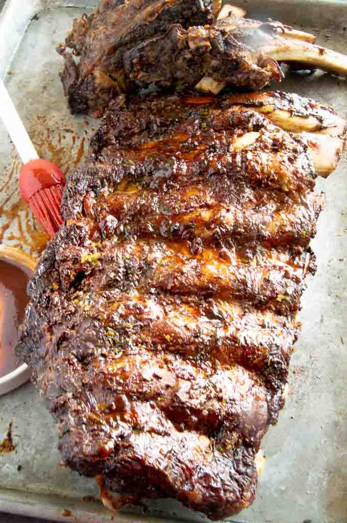 Full slab of Oven baked beef ribs on a try