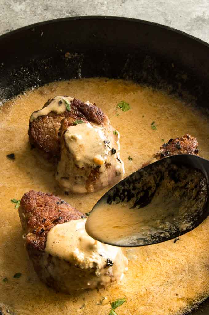 Pork Medallions with Blue Cheese Sauce cut cut from a pork tenderloin to steaks pan seared to tender juicy perfection is then topped with a decadent, but simple blue cheese pan sauce in 30 minutes for easy casual entertaining! 