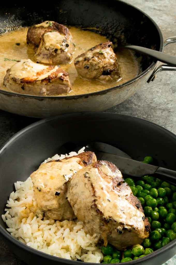 Tender Pork medallions with blue cheese sauce spooned over! One pan meal