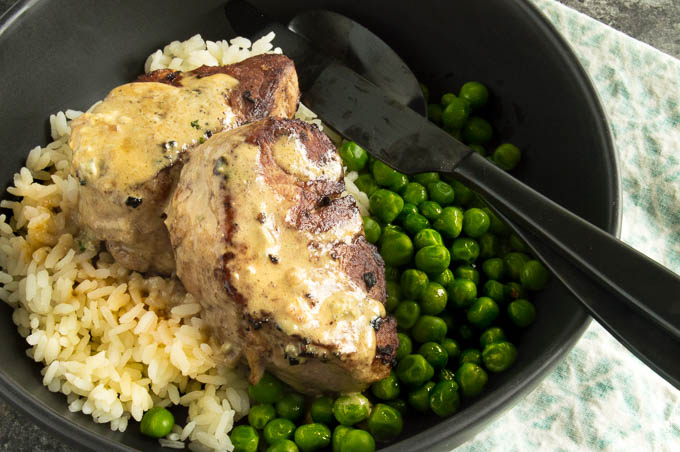 Pork Medallions with Blue Cheese Sauce cut cut from a pork tenderloin to steaks pan seared to tender juicy perfection is then topped with a decadent, but simple blue cheese pan sauce in 30 minutes for easy casual entertaining!