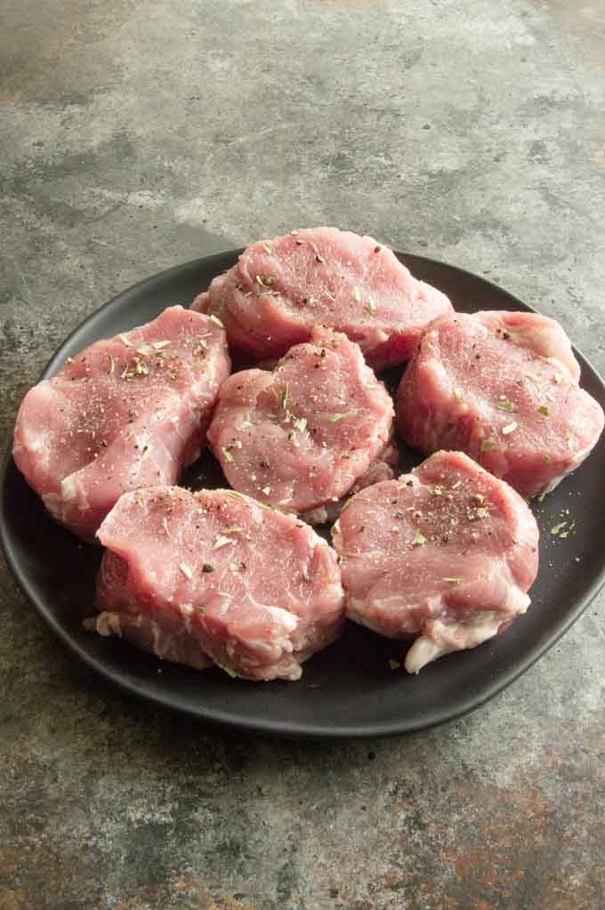 Pork Medallions on a plate ready to cook