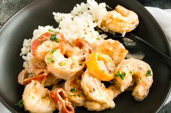 This Shrimp Alfredo Recipe is full of creamy, cheesy and velvety sauce all around tender succulent shrimp!  Easy comfort food that comes together in one pan in 30 minute for easy weeknight meal entertaining.