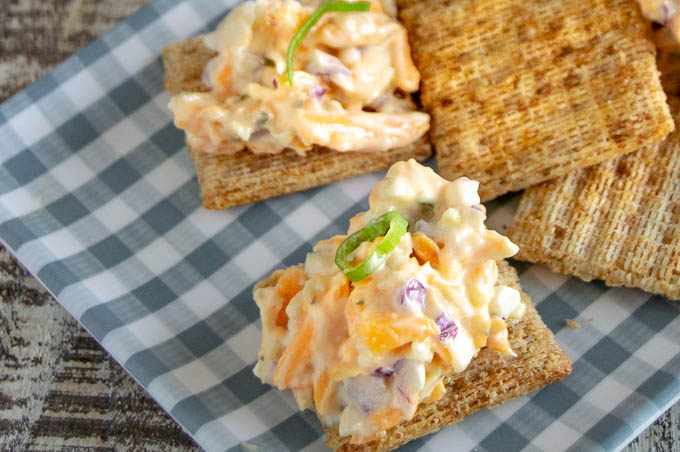 This 5 minute crack dip comes together in 5 minutes and is perfect for serving with crackers. Ideal for pool side snacking, game day snacking or just to serve with cocktails!