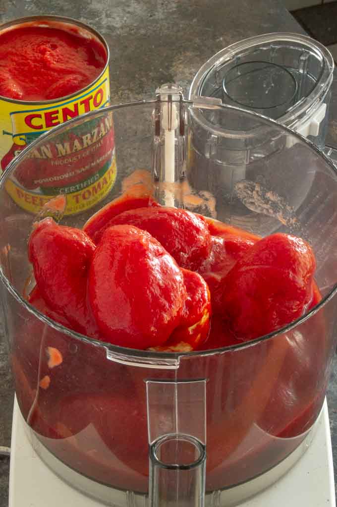 Pureeing san marzano tomatoes for marinara in a food processor