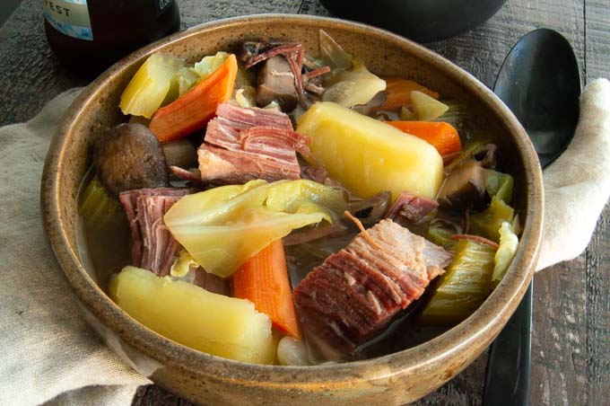 Leftover Corned Beef makes the most delicious Corned beef and Cabbage Soup. Filled with cabbage, mushrooms, celery, carrots and onions surrounding big chunks of corned beef in a deep rich flavorful broth.