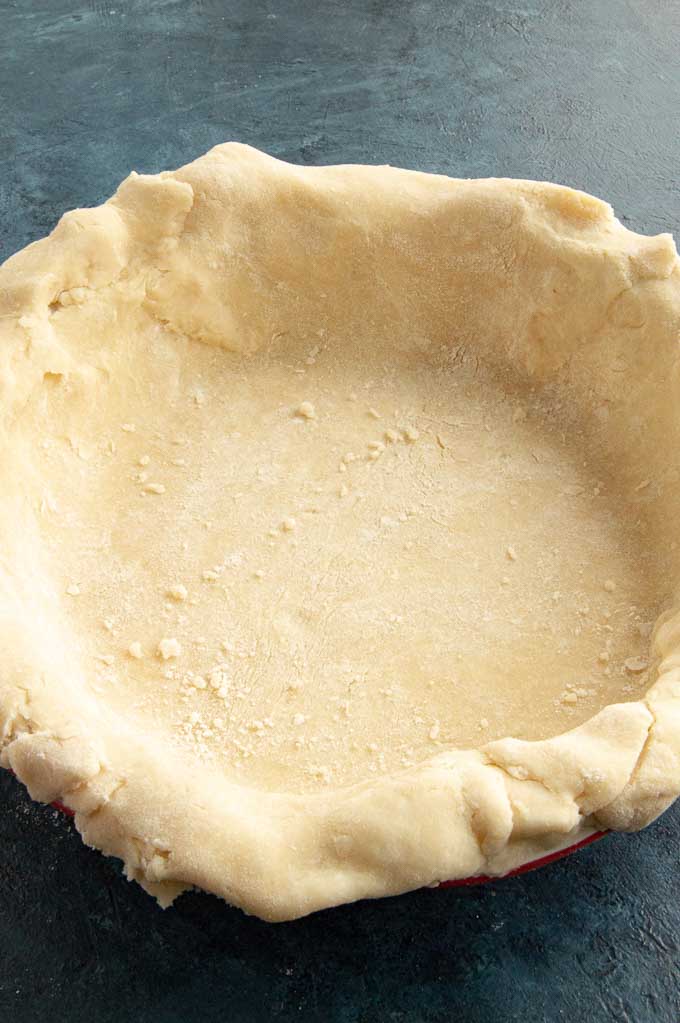 Pie crust placed in pie pan
