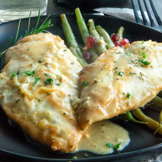 plate of chicken skillet with mustard and rosemary sauce