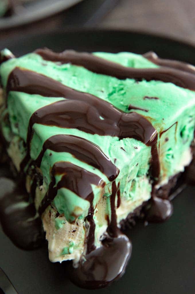 close up of chocolate drizzle on top of grasshopper pie
