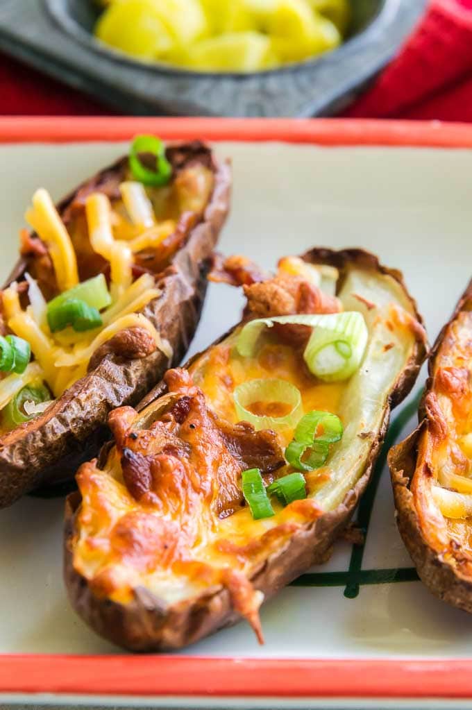 Loaded Air fryer tater skin with cheese, bacon and chives