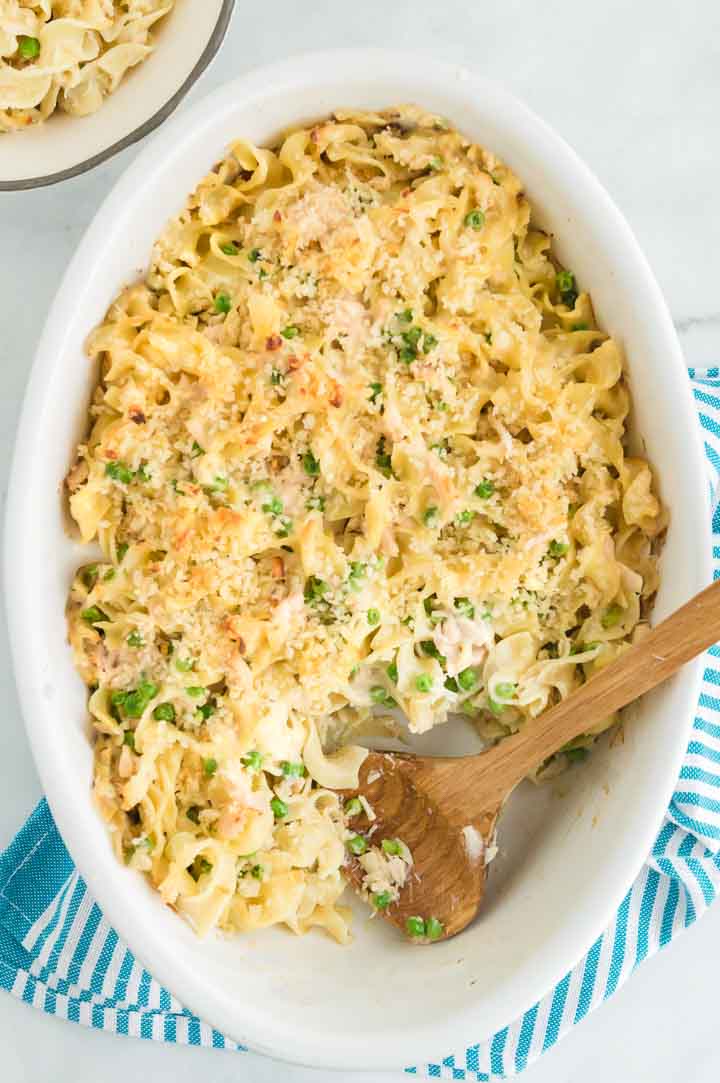 Cheesy Chicken Artichoke casserole! THE amazing potluck dish everyone