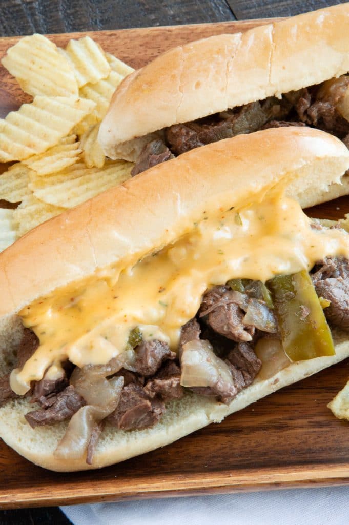 Cheese drizzled over philly Sammy