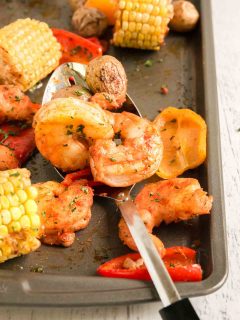 sheet pan shrimp with cajun seasoning on tray