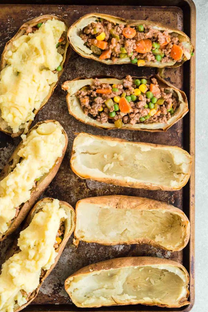 Filling Potato Boats with meat filling